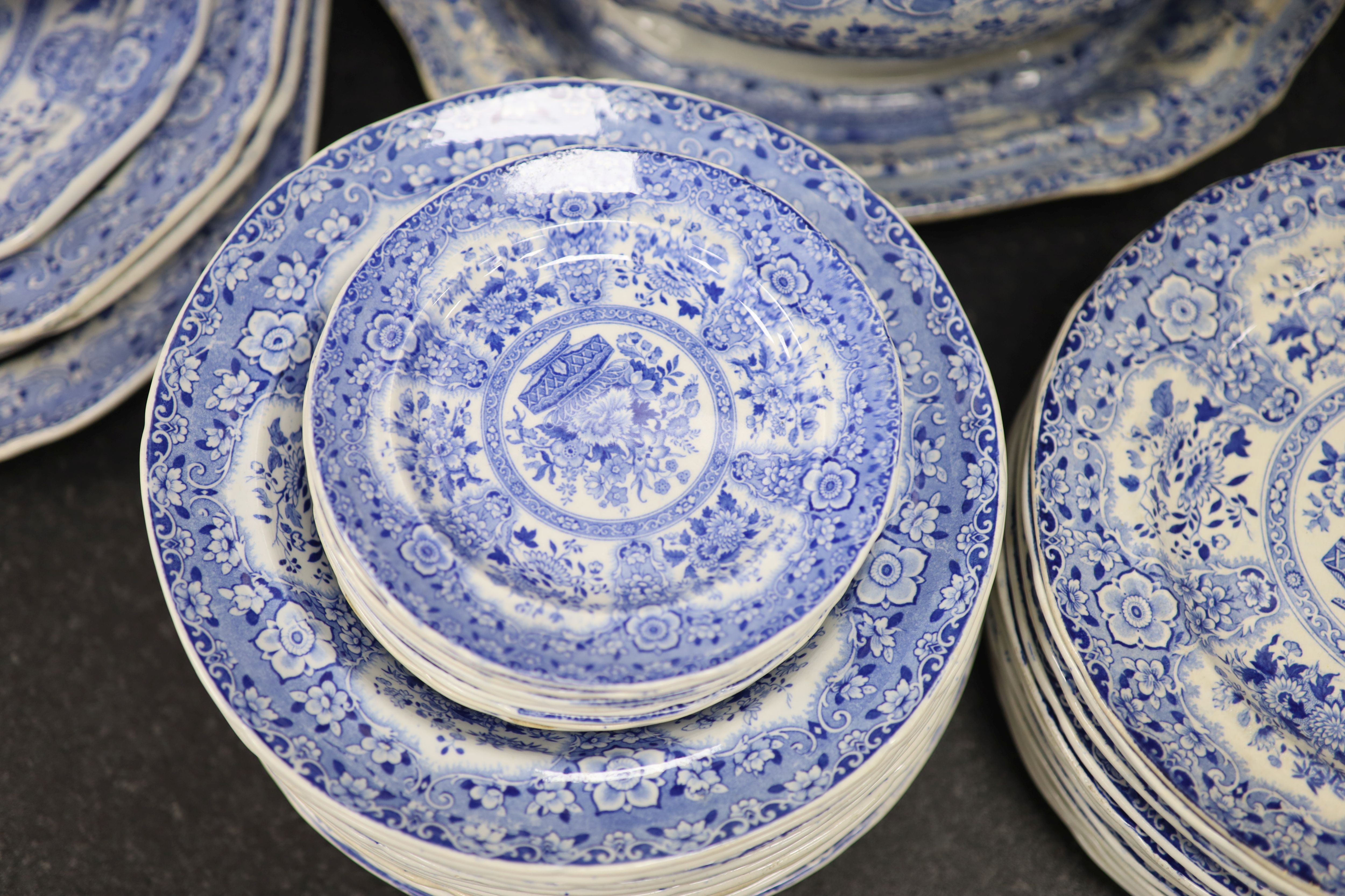 An extensive Minton filigree pattern blue and white dinner service, c.1830,